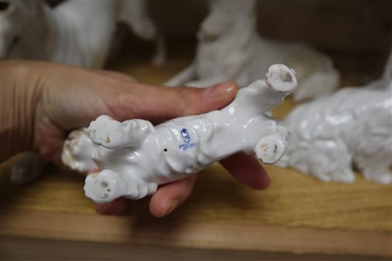 Two Bing & Grondahl dogs, two Augarten porcelain dogs and another (5)